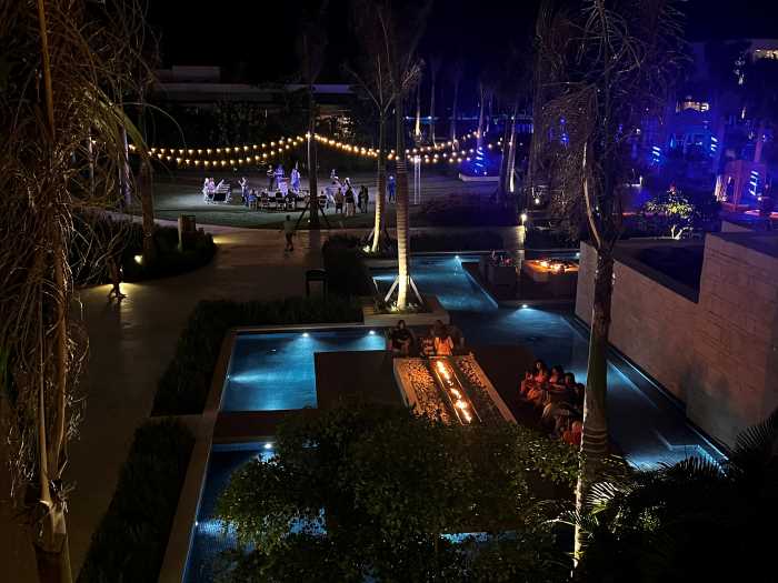 Hyatt Zilara Cap Cana, right outside Punta Cana pool and lounge area beautifully lit after dark. 